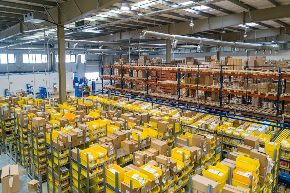 Fulfilment warehouse with shelves of packaged goods
