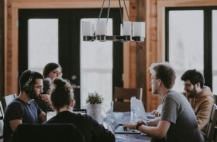 Team discussion around a meeting table